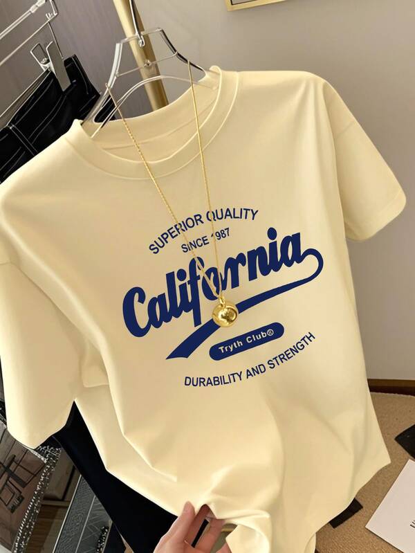 White short-sleeved mid-length T-shirt with English graphics printed on it, women's summer casual top